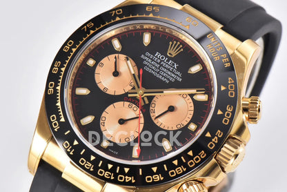 Daytona 116518LN Black/Champagne Index “Newman” Dial in Yellow Gold on Rubber Strap